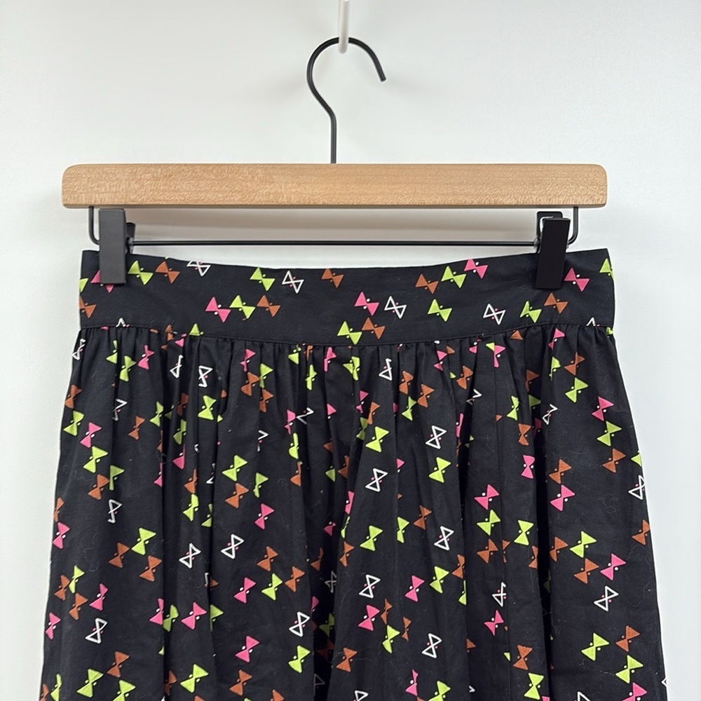 Trashy Diva Bow Graphic '50s Pleated A-Line Skirt Novelty Print Preppy Black 8 - Picture 3 of 8